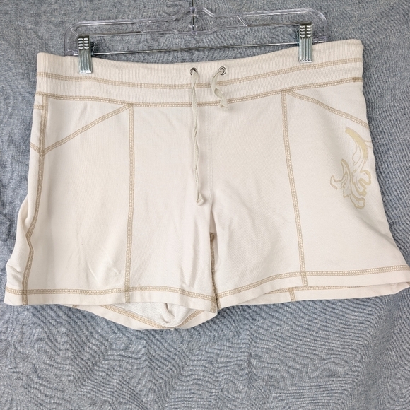 Athleta Pants - Athleta cream French terry shorts w/contrast stitching floral detail